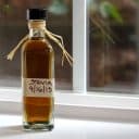 Bottle of stevia extract sitting on a window sill