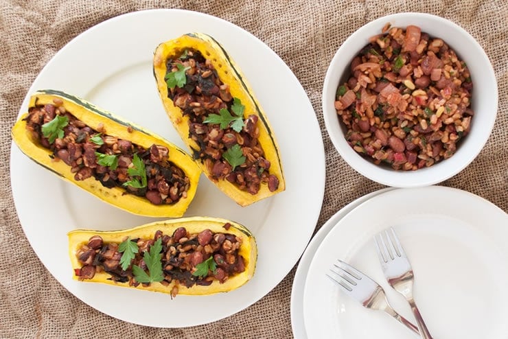 Stuffed Delicata Squash with Greens, Grains, and Beans