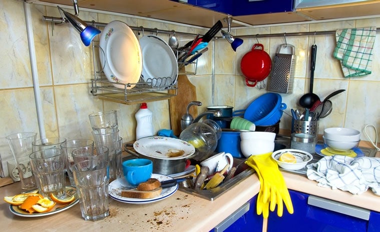 Sink full of dirty dishes