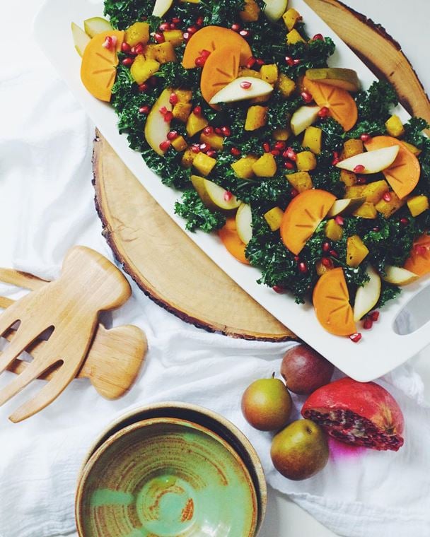 Garlicky Kale Persimmon Salad in a serving bowl