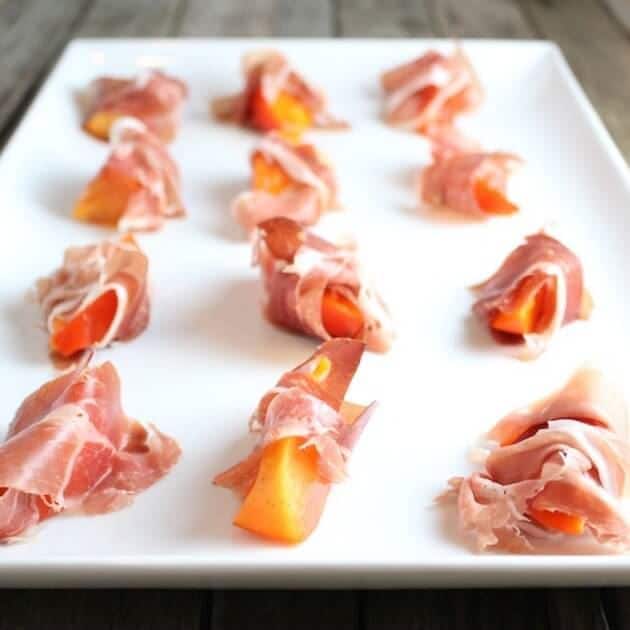 Tray of Persimmons Wrapped in Prosciutto